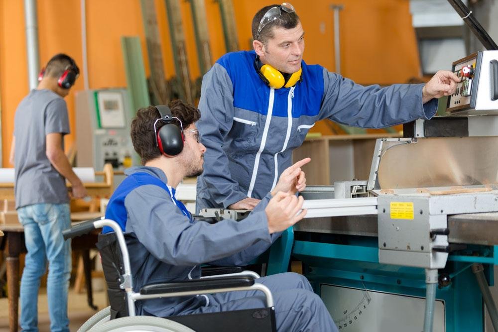 Learning workshop skills on the job with support